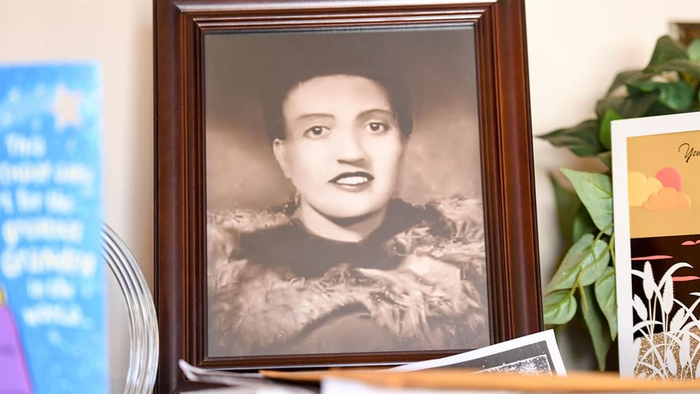 A photo of Henrietta Lacks is shown in the living room of her grandson, Ron Lacks, in 2017