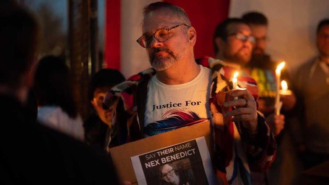 People attend a candlelight vigil for 16-year-old nonbinary student Nex Benedict on February 24, 2024 in Oklahoma City, Oklahoma